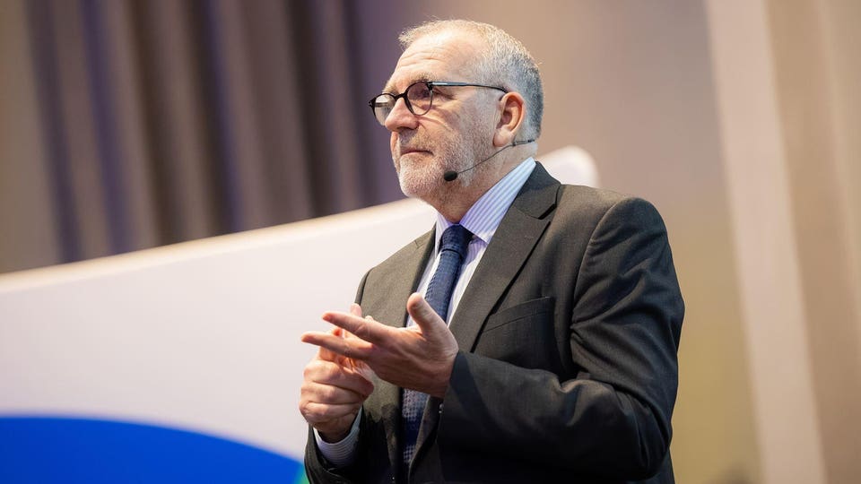 ETRC Business Forum 2026 with president Nigel Keal on stage.  