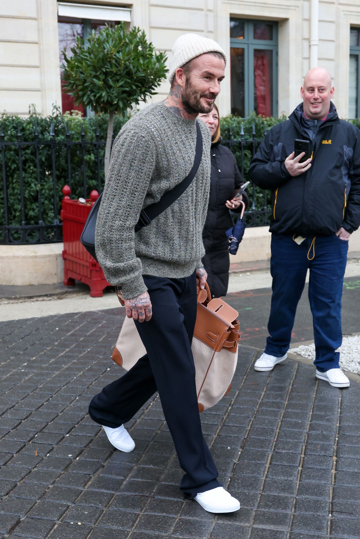  David carried an oversized Hermes tote bag