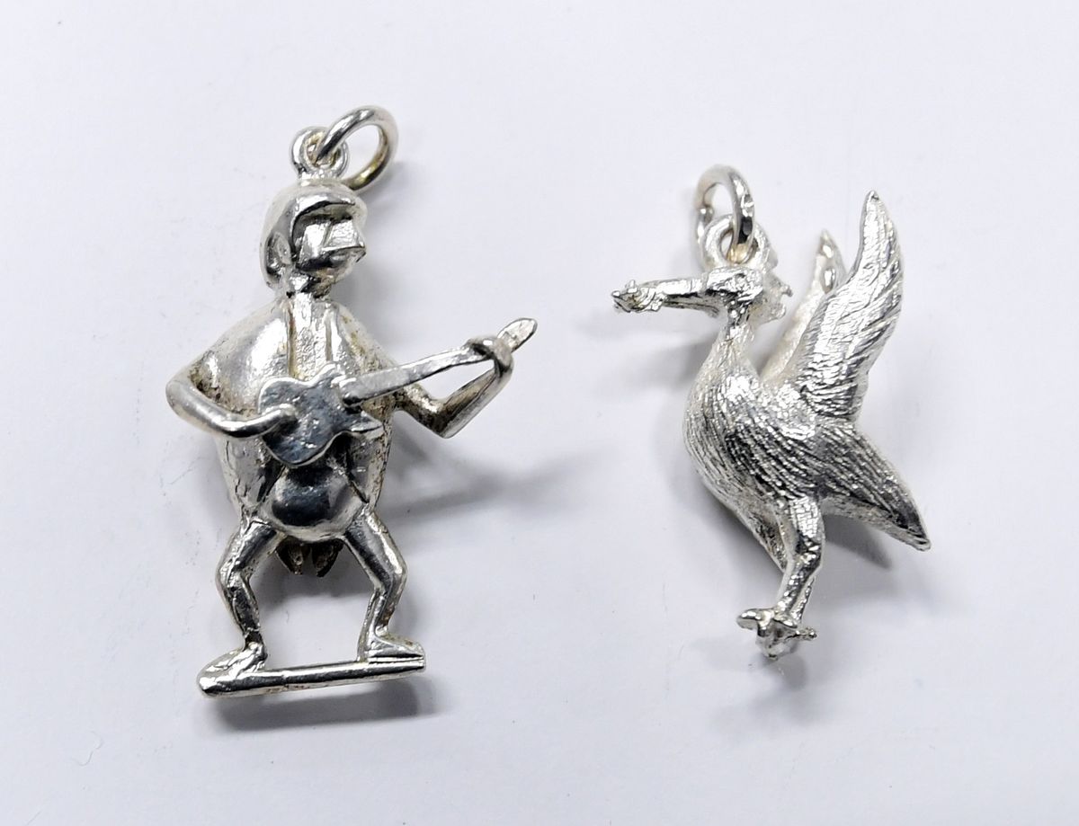 Miniature Silver Beatles and Liver Bird at FA Welch bespoke Jewellers