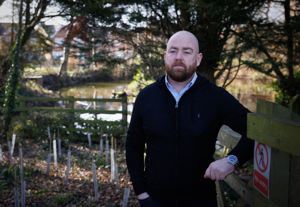 David Leatherbarrow by the side of Moss Side Lake in the Poppy Fields estate, Maghull
