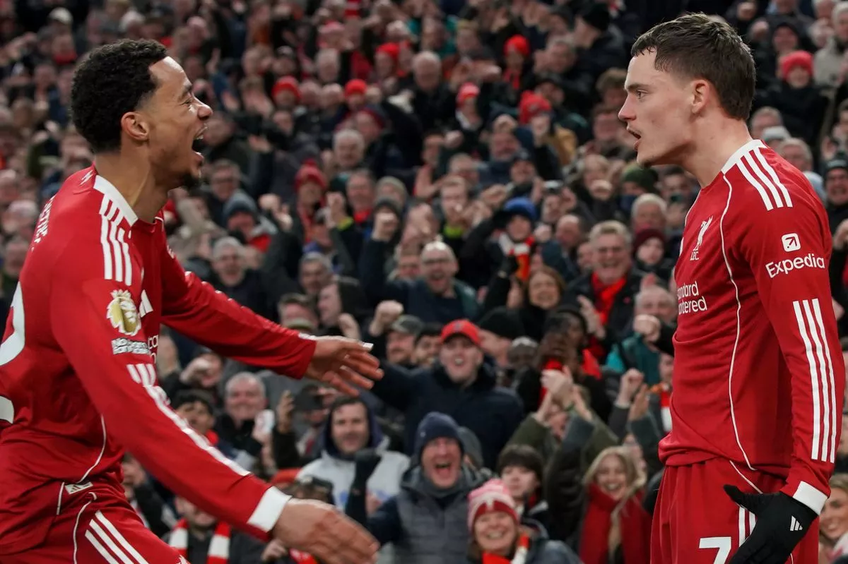 Liverpool's Florian Wirtz, right, celebrates with Liverpool's Hugo Ekitike after scoring
