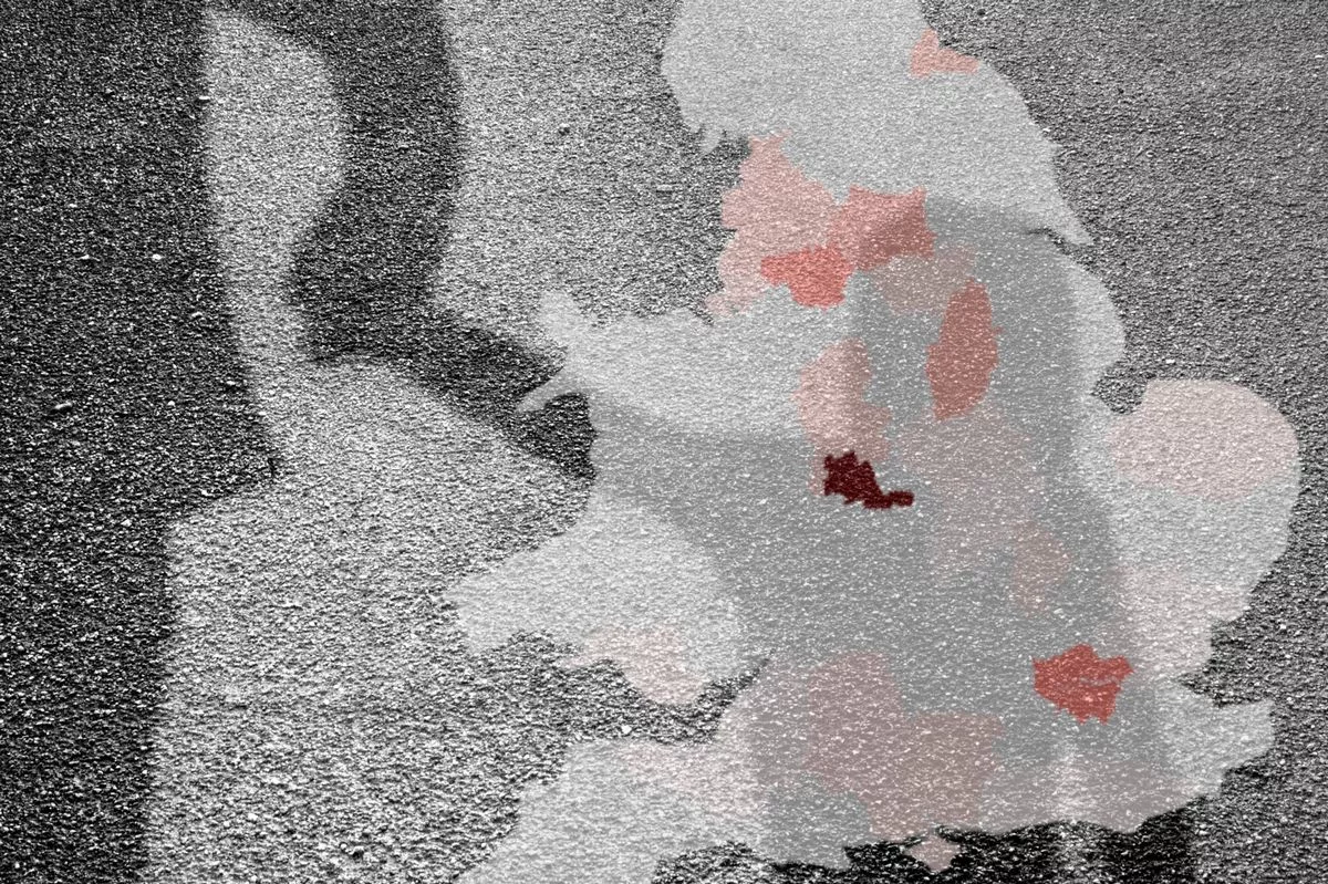 A map of Britain with areas highlighted red to represent places where sexually exploited children have been criminalised. Over the map is the shadow of a child holding the hand of an adult