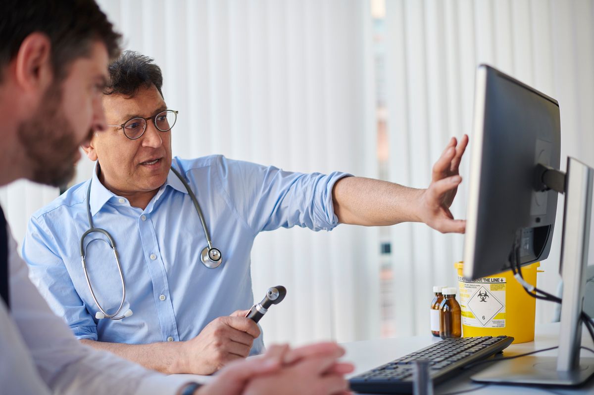 Doctor talking to a patient