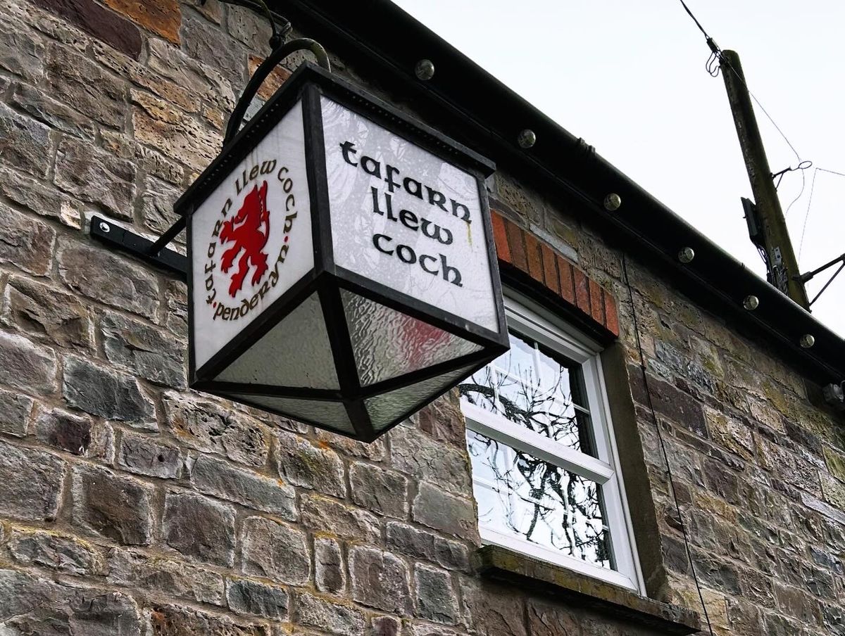 A sign outside a pub