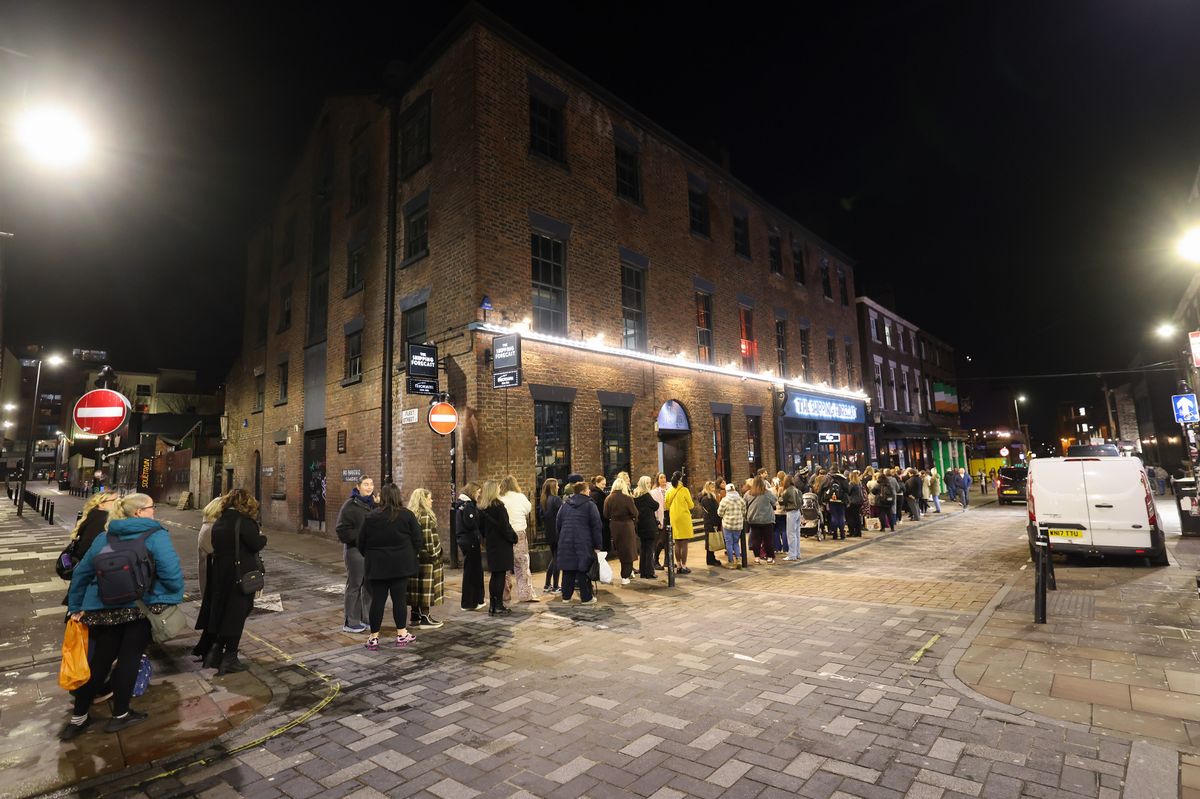 Fans queuing for The Jacaranda
