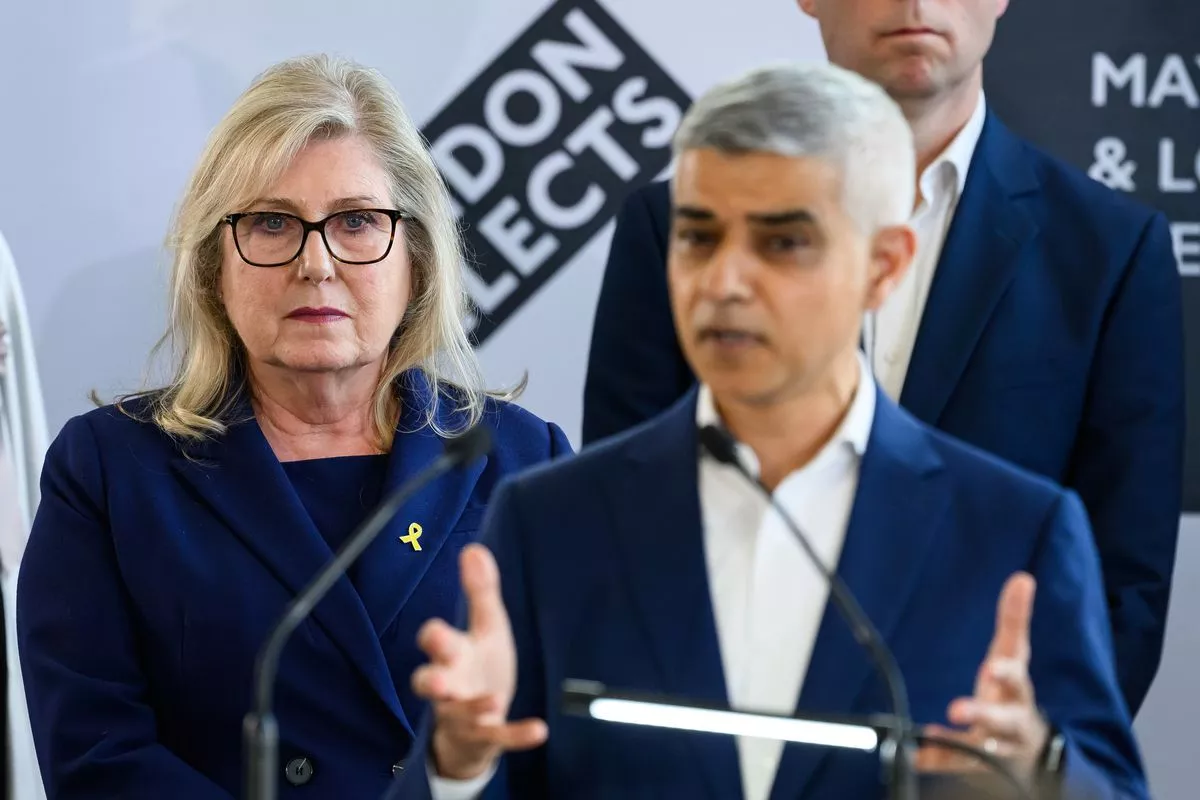 Incumbent Labour London Mayor, Sadiq Khan, (R) speaks after winning an historic third term in office, beating the Conservative candidate, Susan Hall (L)