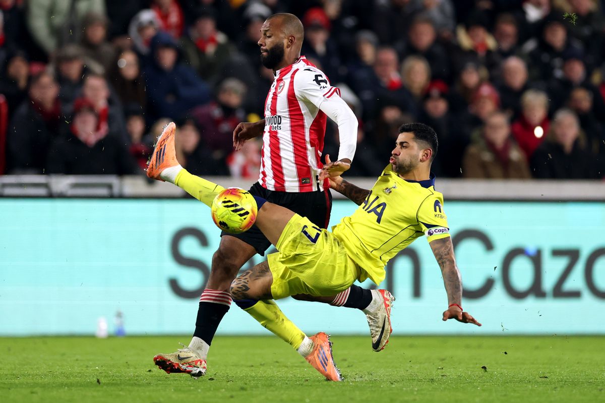  Igor Thiago of Brentford is challenged by Cristian Romero of Tottenham Hotspur