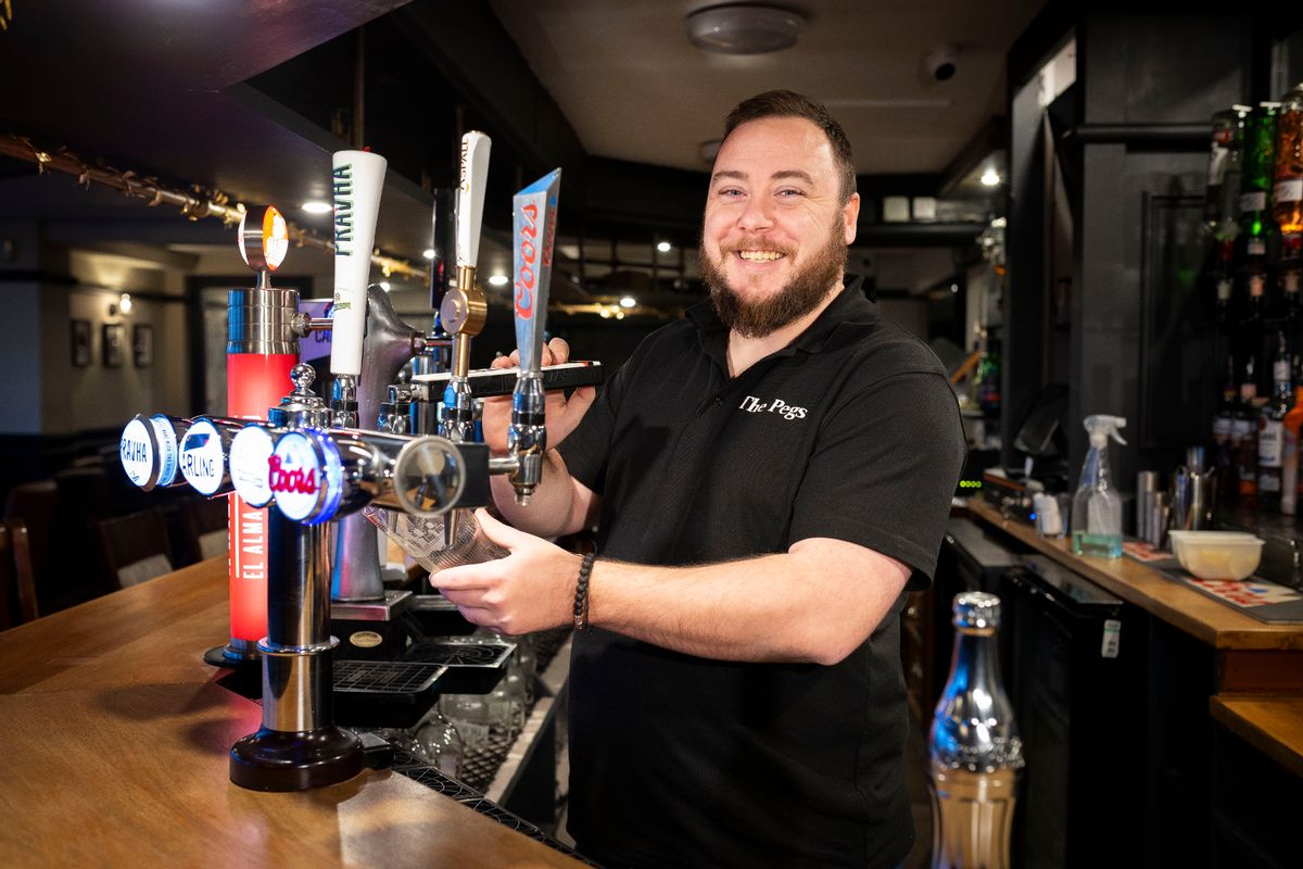 Corey Whittaker behind the bar at the Pegs Langtern