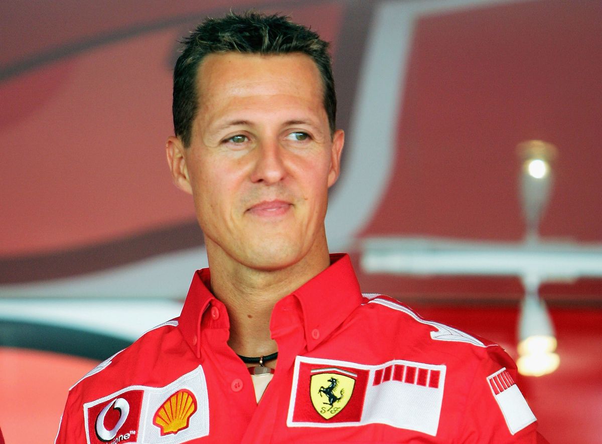 Michael Schumacher looks on