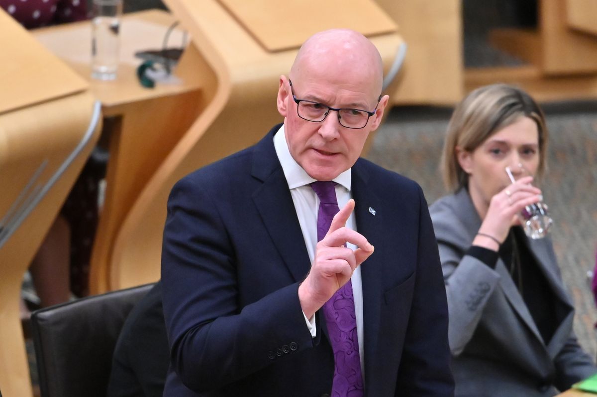  John Swinney during First Minister's Questions in the Scottish Parliament