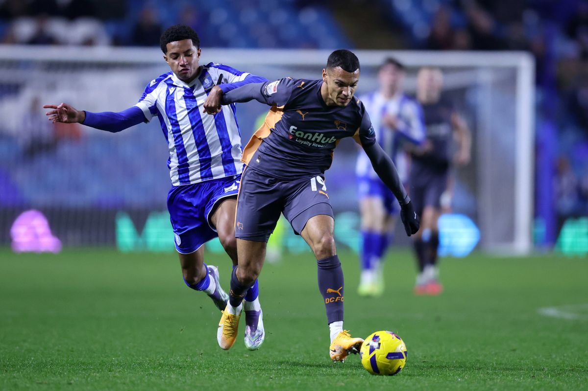 Derby County's Kayden Jackson (right) and Sheffield Wednesday’s Yisa Alao battle for the ball during the Sky Bet Championship match at Hillsborough Stadium, Sheffield. Picture date: Monday December 15, 2025. PA Photo. Photo credit should read: Nigel French/PA Wire.

RESTRICTIONS: EDITORIAL USE ONLY No use with unauthorised audio, video, data, fixture lists, club/league logos or "live" services. Online in-match use limited to 120 images, no video emulation. No use in betting, games or single club/league/player publications.