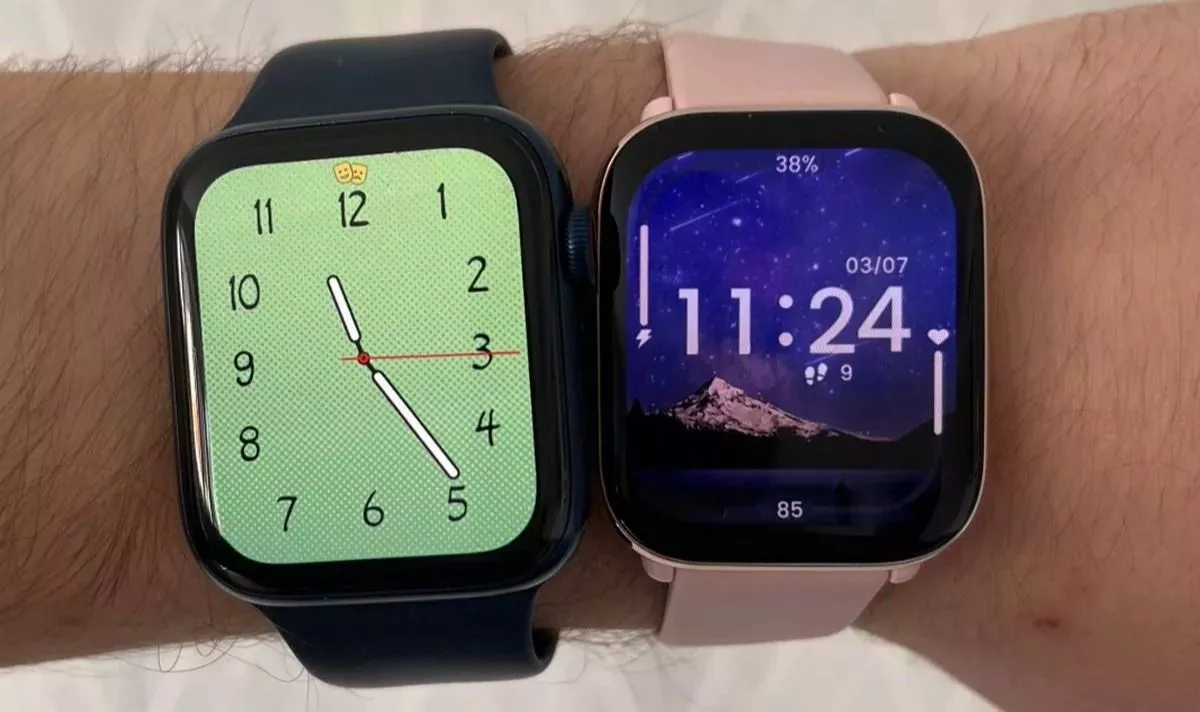 Two smartwatches on a wrist