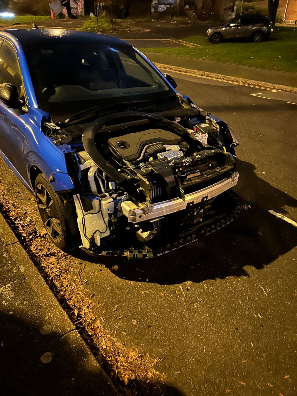 A shredded car outside St Andrew's stadium 