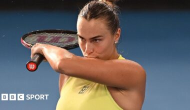 Jannik Sinner and Carlos Alcaraz laugh during the Australian Open's One Point Slam event