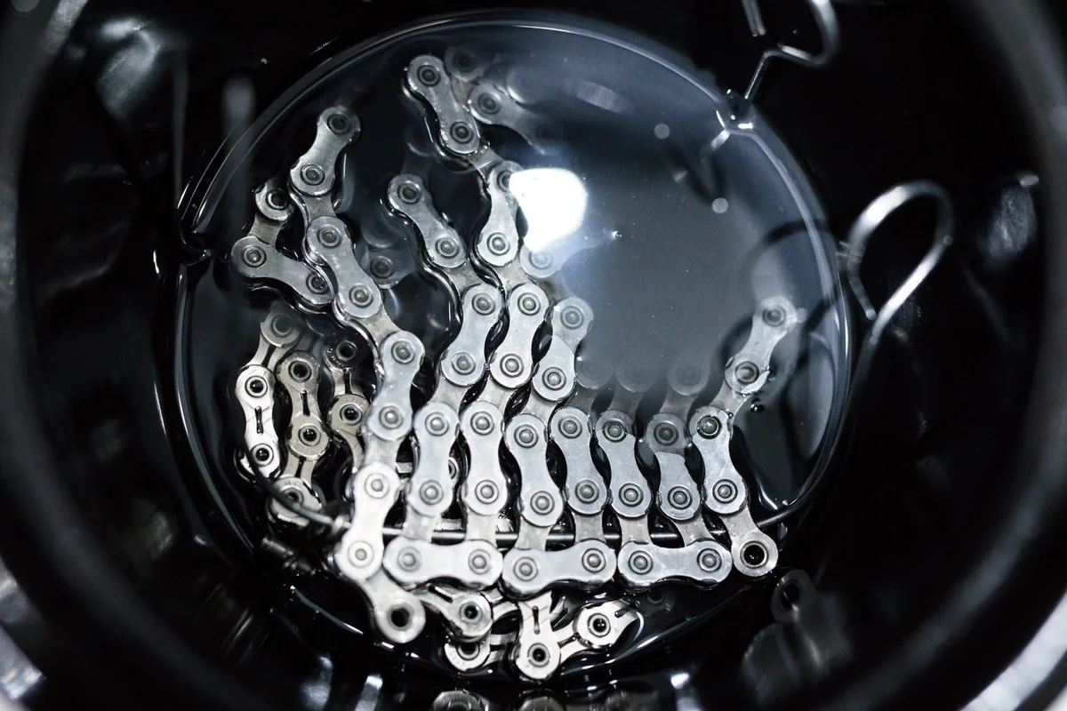 Chains in slow cooker with wax