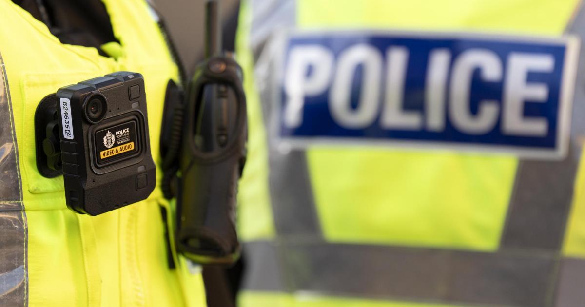 Armed police lock down Edinburgh street as man taken to hospital