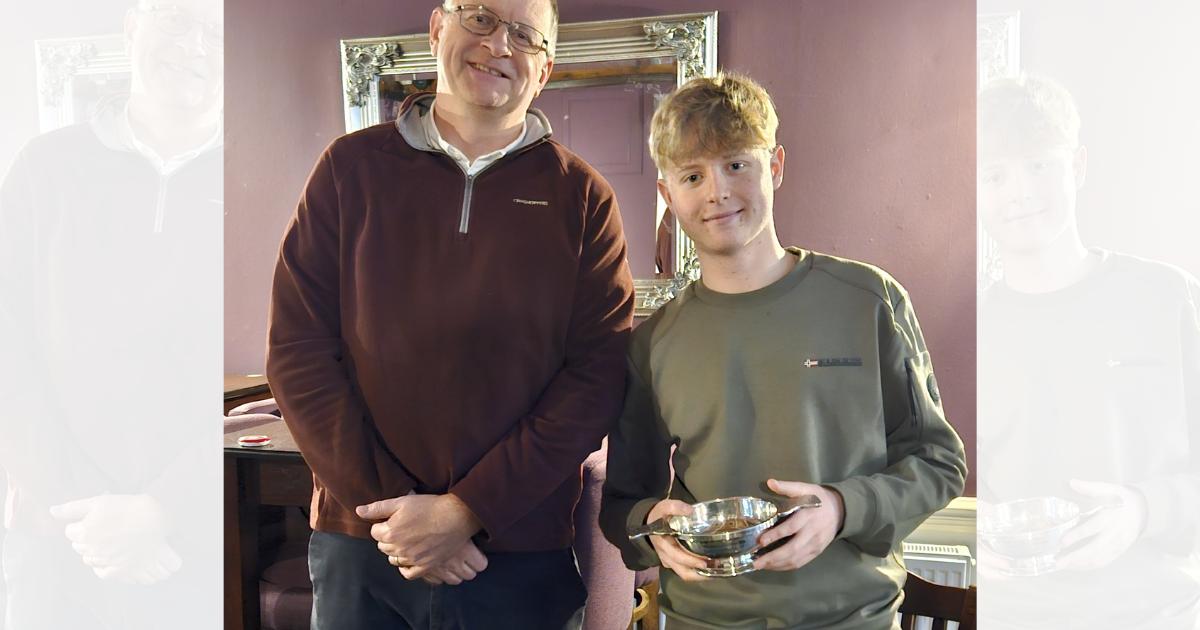 Rob Renton Memorial Trophy is presented to Shane Hay