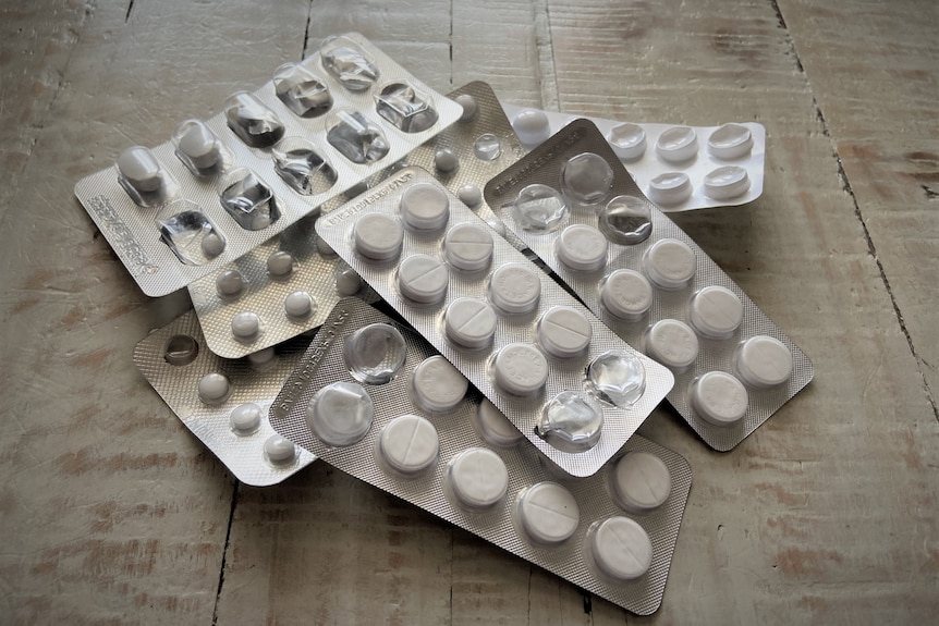 A stack of pills on a table