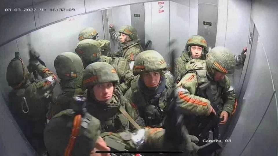 A security camera photo of Russian soldiers stuck in an elevator in Kherson, Ukraine.