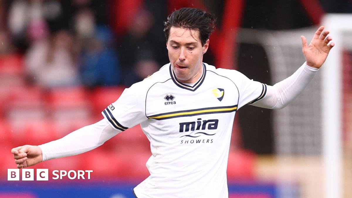 Isaac Hutchinson in action for Cheltenham