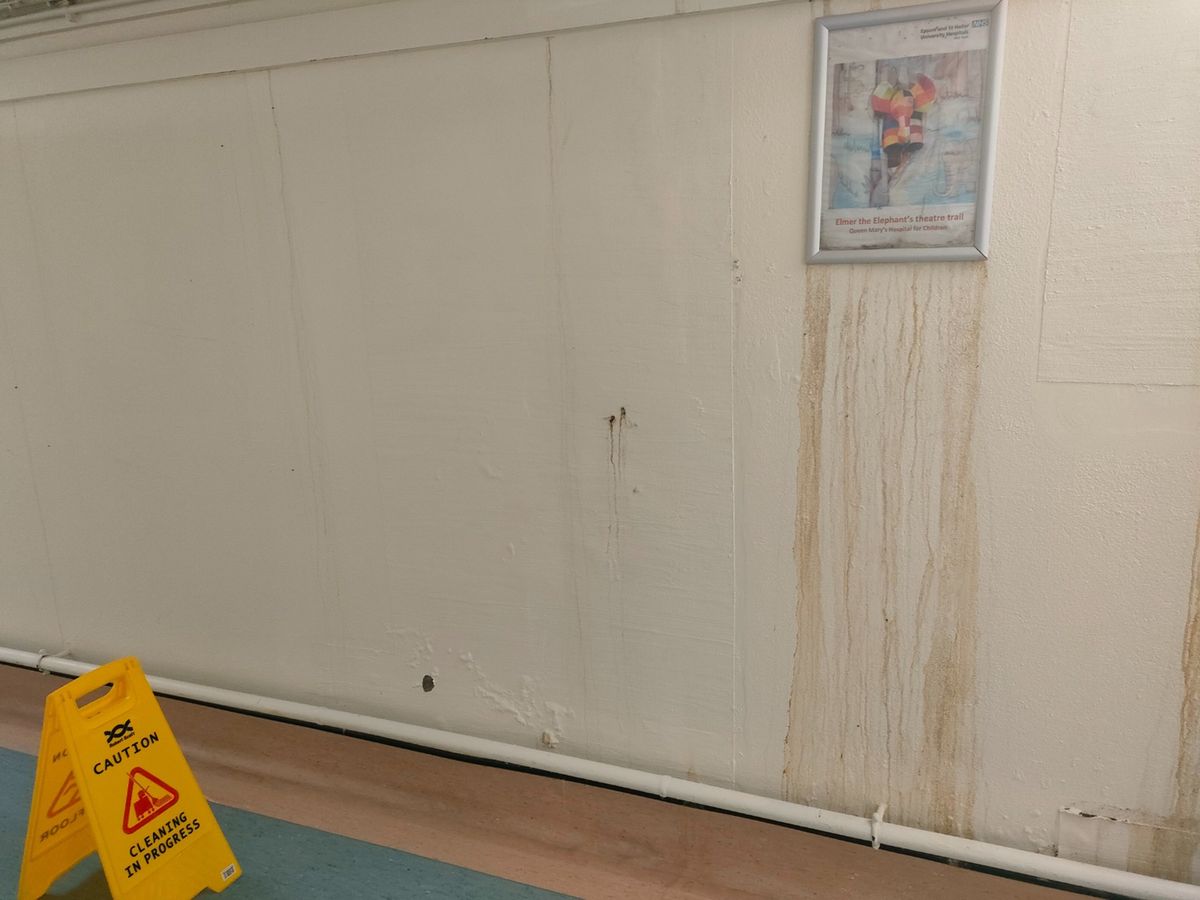 Images of the hallways in St Helier's Hospital, where staff are reportedly working in areas with damp mould, leaking roofs, and floods.