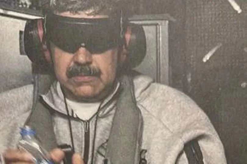 This image posted on US President Donald Trump's Truth Social account on January 3, 2026, shows what President Trump says is Venezuela's President Nicolas Maduro onboard the USS Iwo Jima after the US military captured him on January 3, 2026.