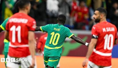 Sadio Mane celebrates scoring against Egypt