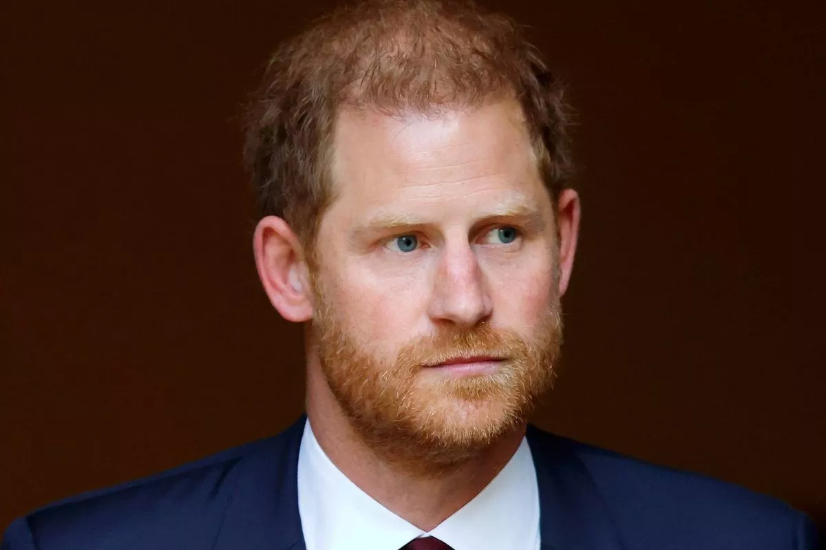 Prince Harry, Duke of Sussex (wearing a Household Division regimental tie and medals including his Knight Commander of the Royal Victorian Order cross) attends The Invictus Games Foundation 