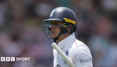 Luke Littler celebrates winning the 2026 PDC World Championship as tickertape falls