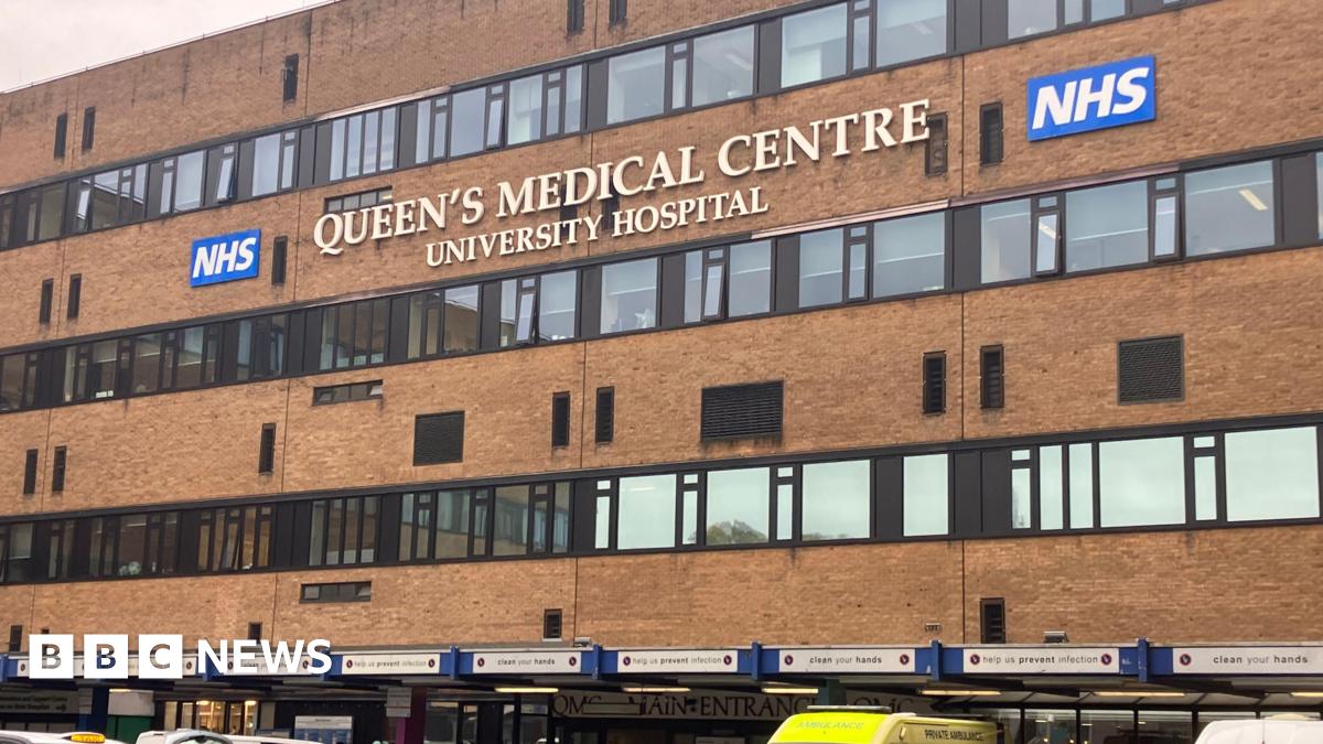 A man walks past a graffiti depicting Venezuelan President Nicolas Maduro in Caracas on January 3, 2026. The colours used in the graffiti are yellow, blue, red and white.