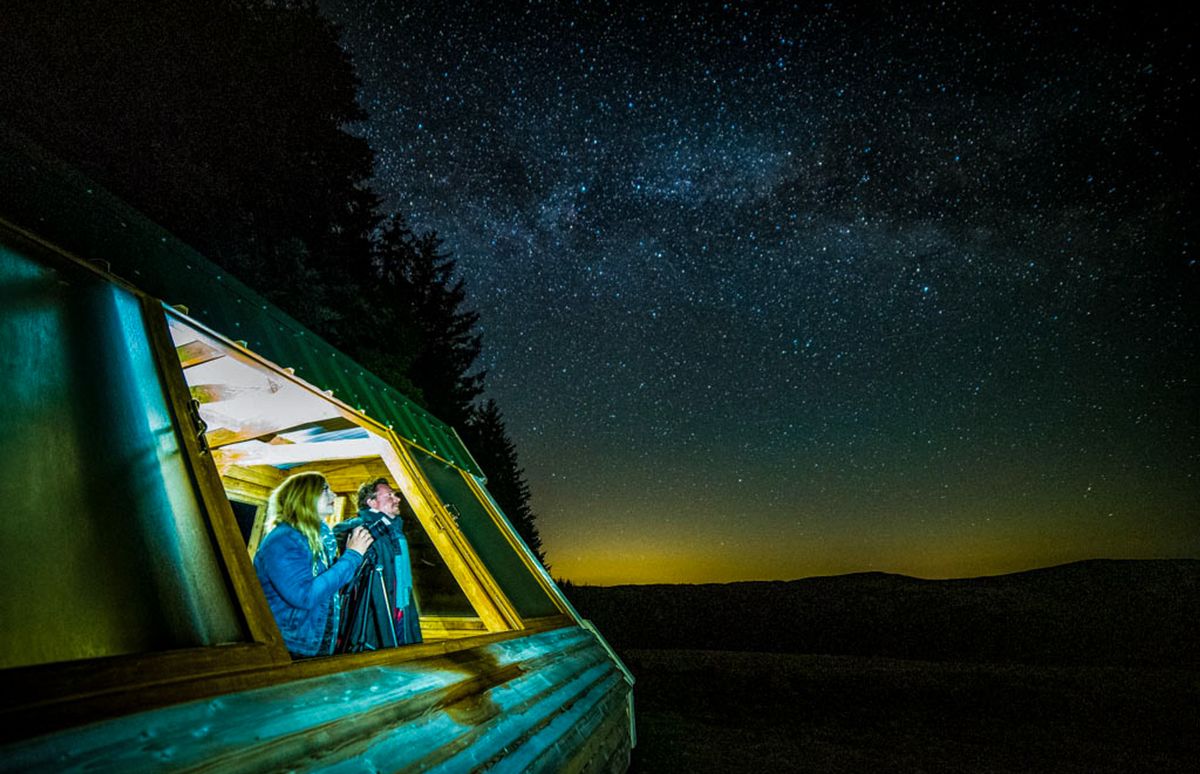 A stargazer looking at the night sky