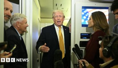 US President Trump aboard Air Force One on 4 January.