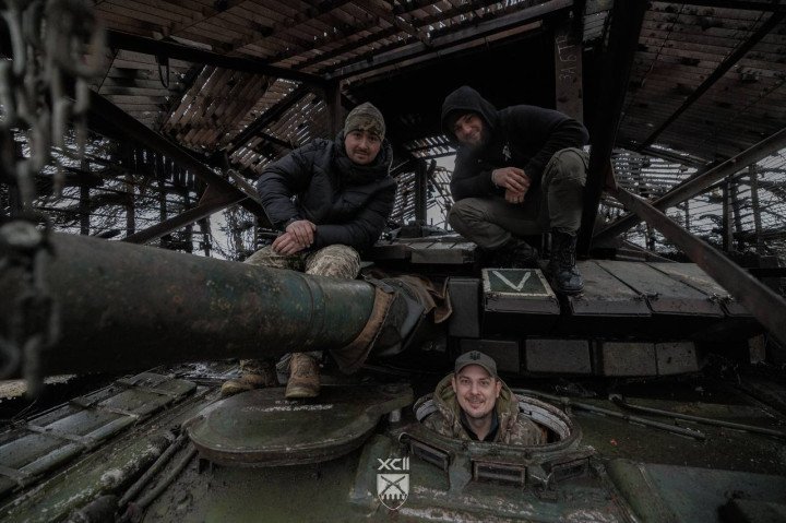 Troops from Ukraine’s 92nd Assault Brigade pose on top of the captured Russian T-80BVM tank. (Photo 92nd Assault Brigade)