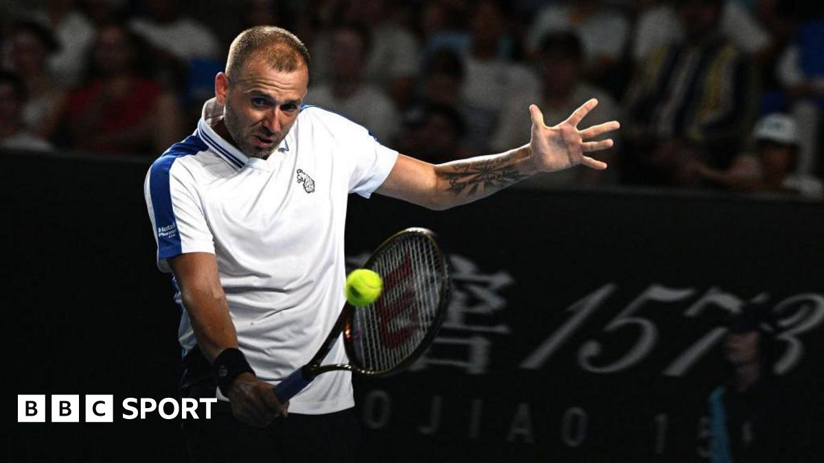 Daniel Evans hits a return