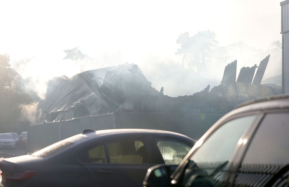 The scene at Fusco Vehicle Sales in Balloo Industrial Estate in Bangor, where a fire on Friday evening destroyed the dealership workshop.  Jonathan Porter/PressEye