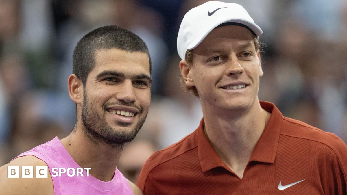 Carlos Alcaraz and Jannik Sinner pose for a photograph before the US Open final in 2025