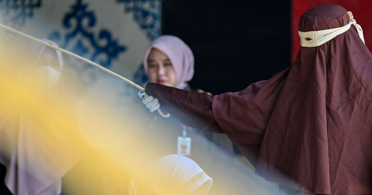 Sharia Law horror as couple caned 140 times for having sex outside marriage | World | News