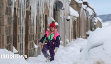 Snow and ice leads to school closures and travel problems after UK's coldest night of winter - live updates