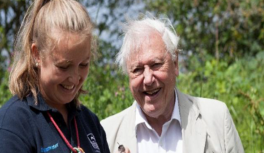Sir David Attenborough with a member of Leicestershire and Rutland Wildlife Trust at a bird ringing demonstration at the Volunteer Training Centre in Rutland