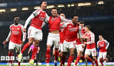 Arsenal players celebrate their goal