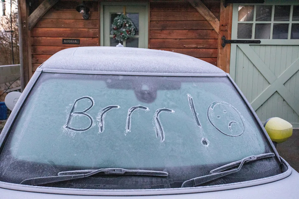 UK Weather: A severe overnight frost has left a frozen wintry landscape and below freezing this morning over rural Flintshire near the village of Lixwm as a motorisit discoverd etching in the ice of a winscreen. 27th December 2025, Flintshire, Wales ©DGDImages/Alamy Live News
