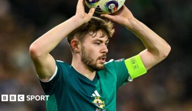 Conor Bradley takes a throw in