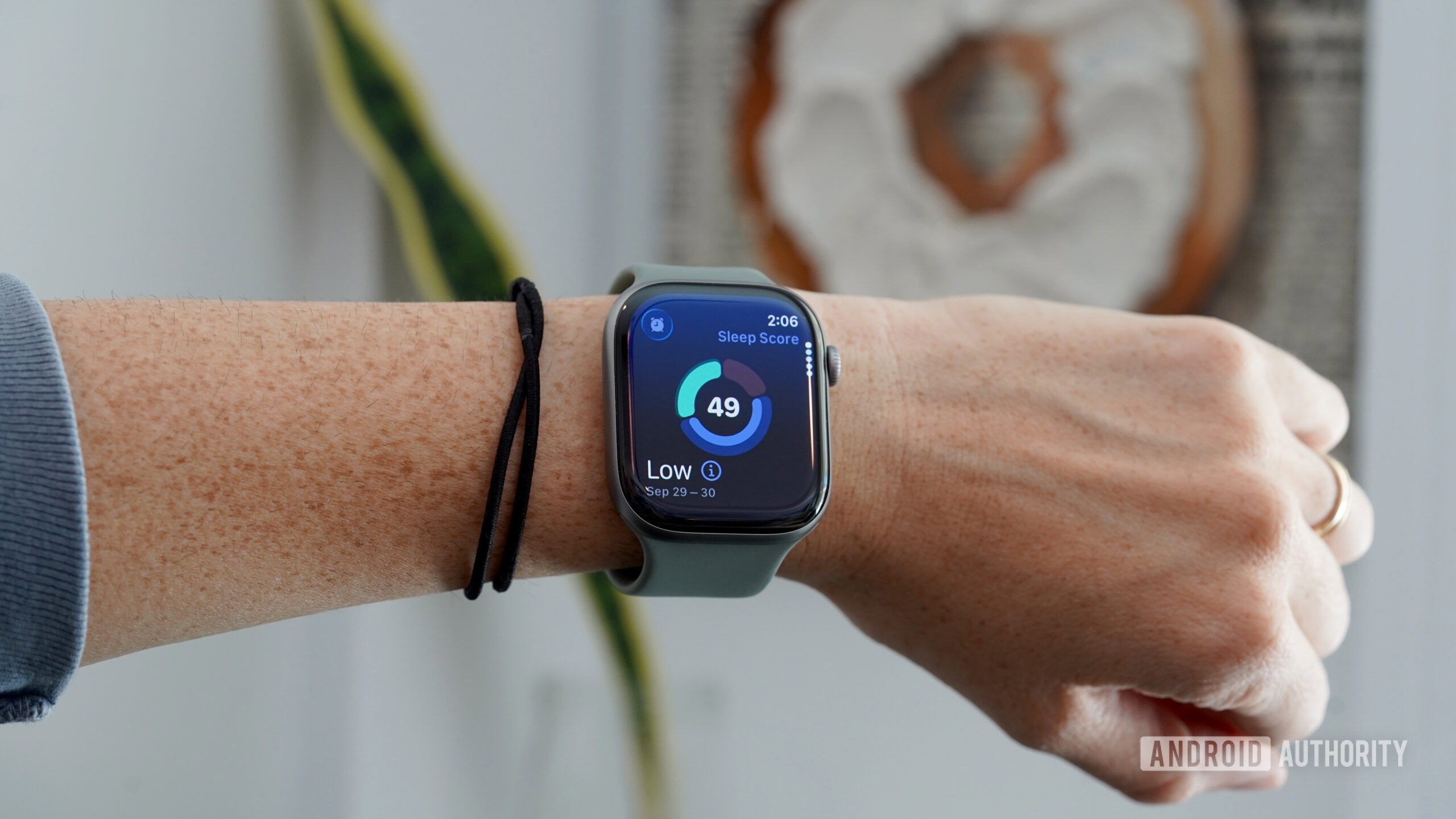 An Apple Watch Series 11 displays a user's Sleep Score.