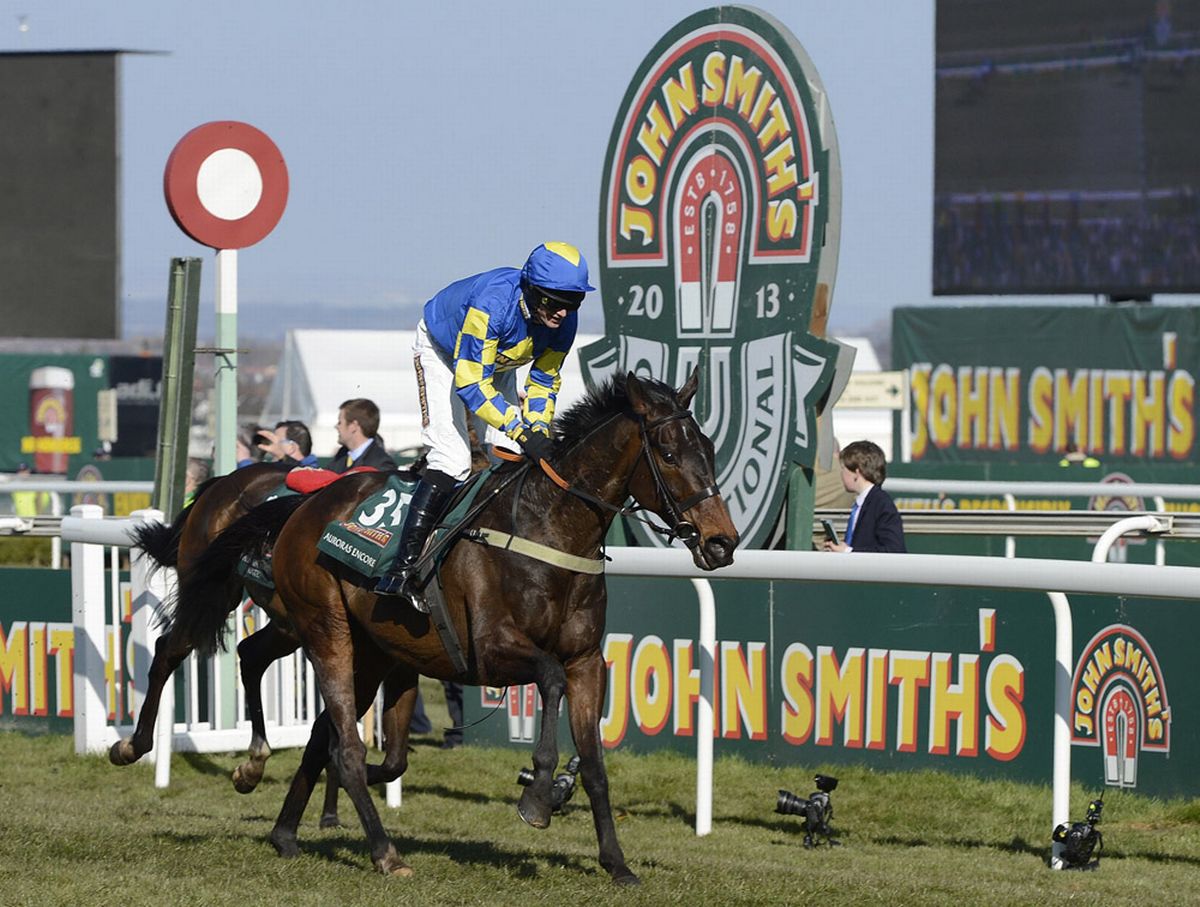 Auroras Encore ridden by Ryan Mania wins the Grand National Steeple Chase