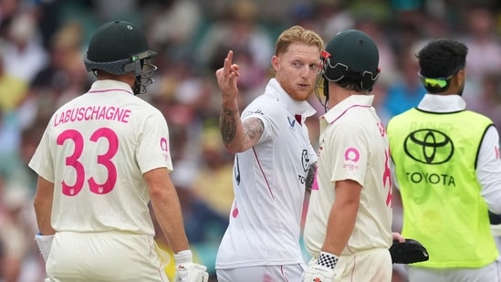 Ben Stokes exchanges words with Australia's Marnus Labuschagne as Travis Head looks on.(REUTERS)
