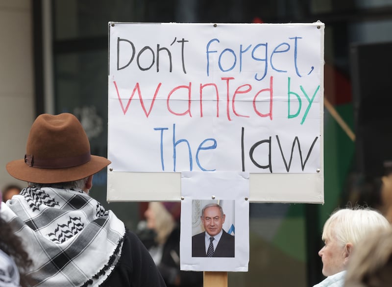 Ireland Palestine Solidarity Campaign during a vigil from Writers square to Erskine on New Years Eve.
PICTURE COLM LENAGHAN