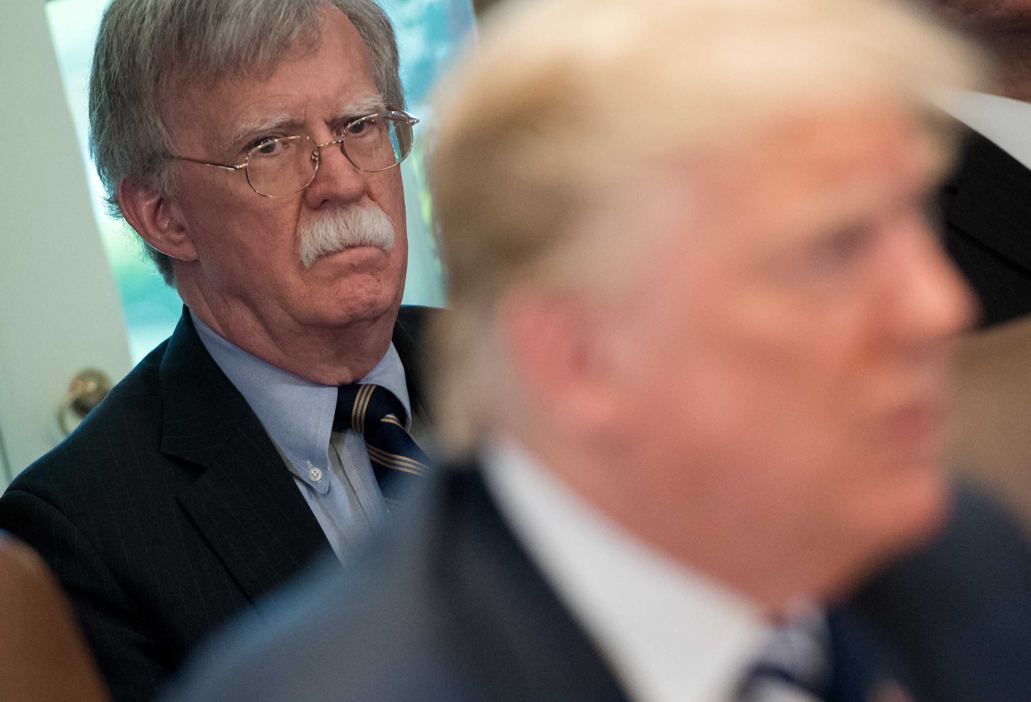 Former national security adviser John Bolton, left, says Nato could be in grave jeopardy