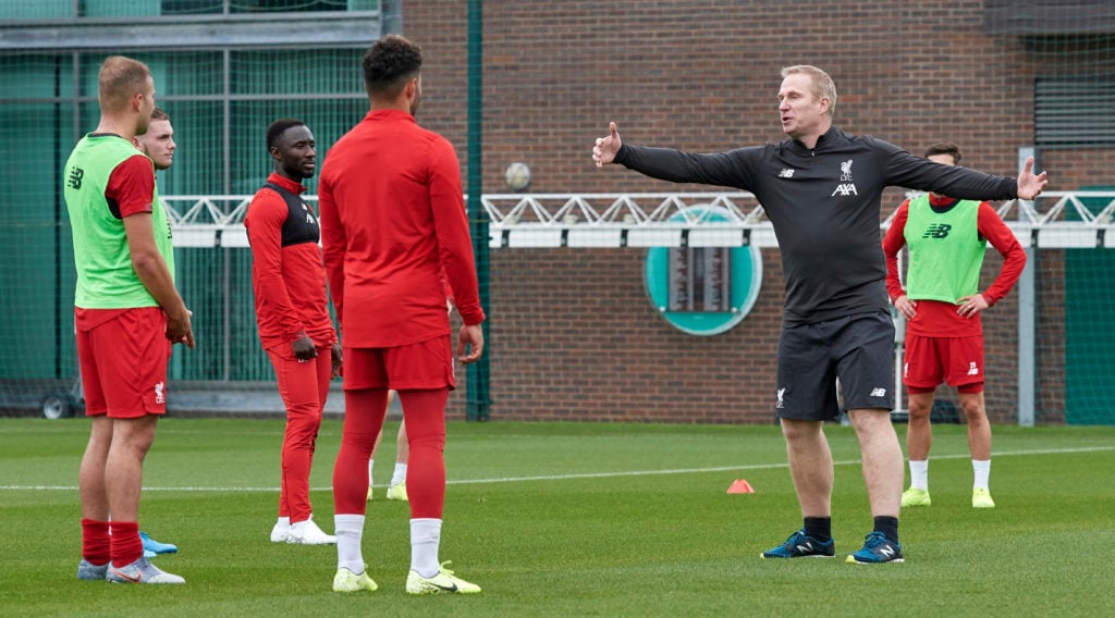 Liverpool throw-in coach Thomas Gronnemark takes a training session.