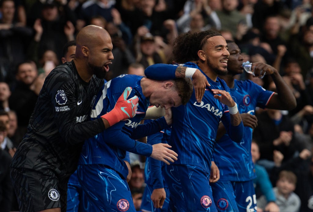 Robert Sanchez, Cole Palmer and Malo Gusto celebrate a Chelsea goal vs Liverpool
