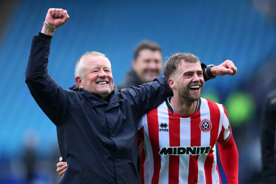 Patrick Bamford celebrating with Chris Wilder